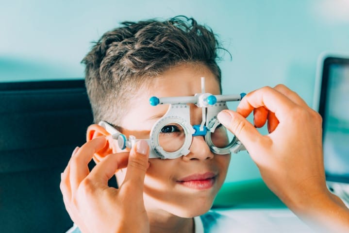 Ophthalmologist doing visual acuity test